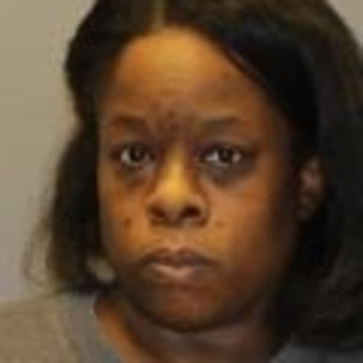 A Long Island woman was charged with bringing an alcoholic beverage into Sing Sing prison. 