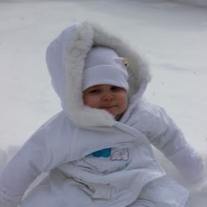 Madison Iannacone, 9 months old, is bundled up in the cold. 