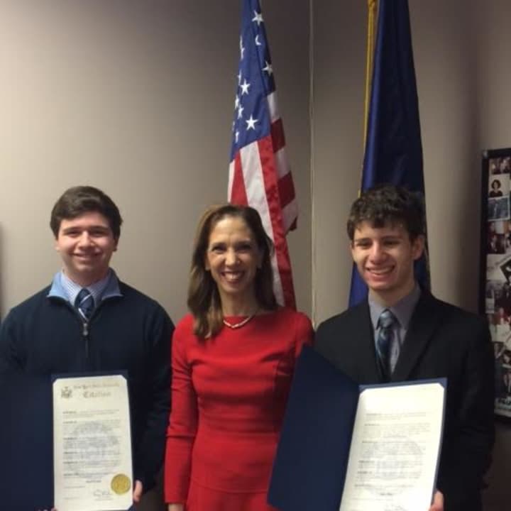Pelham&#x27;s Max Pine (on the left) and Scarsdale&#x27;s David Frank (on the right) stopped by Assemblywoman Amy Paulin&#x27;s office on Wednesday to receive certificates of achievement for their scientific work for the Intel Science Talent Search.