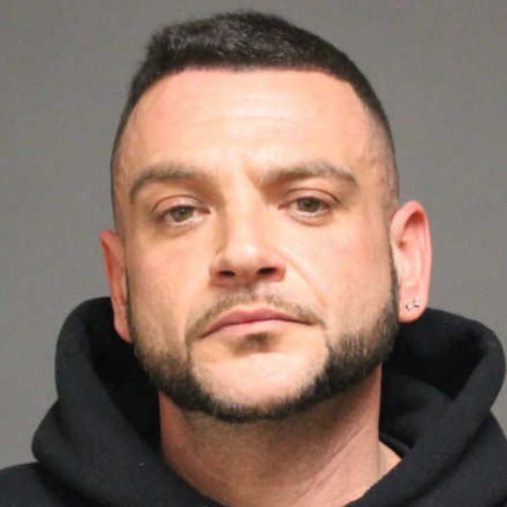 Paul Fanciulli, 35, followed his wife home from work, shouted obscenities at her and tried to block her car from entering the Merritt, police said. 