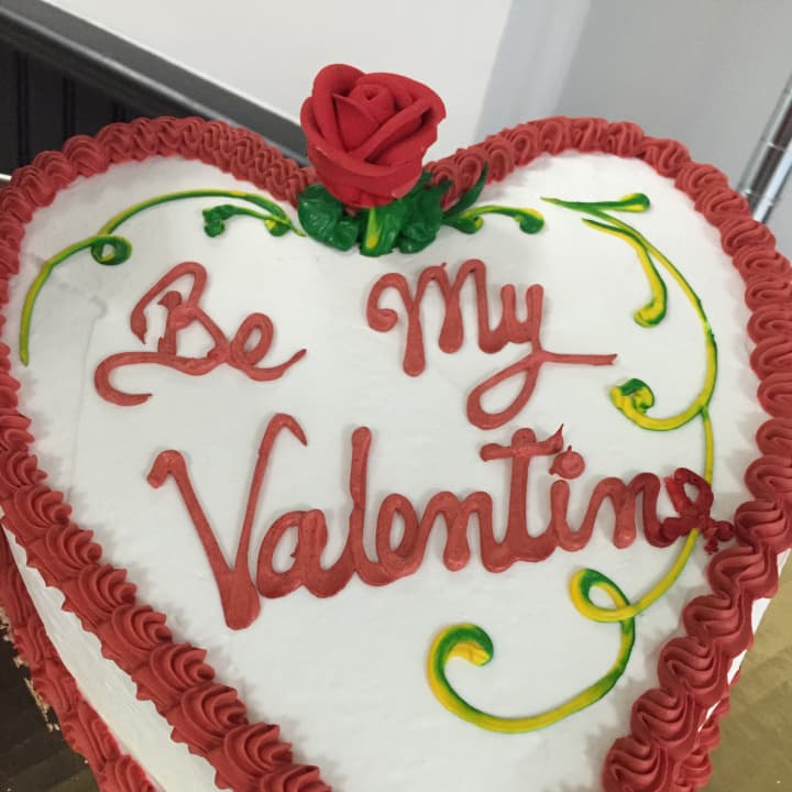 A customized cake is one way to show your love.