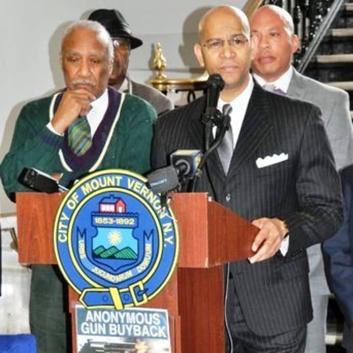 Mount Vernon Mayor Ernie Davis; Westchester County Crime Stoppers Chair Derickson K. Lawrence and Police Commissioner Terrance Raynor announcing the anonymous gun buyback. 
