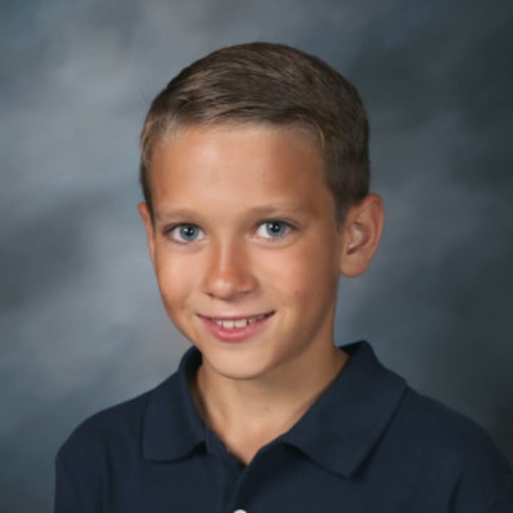 Sixth-grader Brandon Caraballo earns citizenship award. 