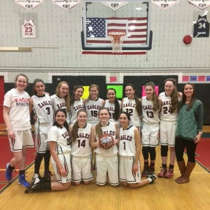 Eastchester&#x27;s Olivia Heffernan was joined by her teammates to celebrate her 1,000th career point. 