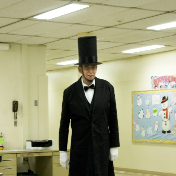 Abraham Lincoln, played by Michael Griest, visited Ben Franklin Elementary second-graders.