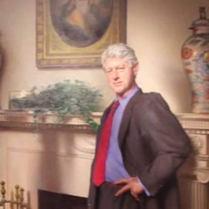 The artist who painted a portrait of Bill Clinton said he included a reference to Monica Lewinsky.
