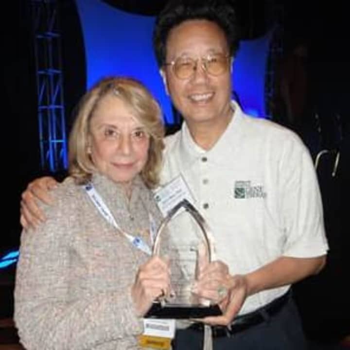 ?Barbara Netter, President and Co-founder of ACGT accepting an award with Dr. Savio L.C. Woo, Chairman Emeritus, ACGT Scientific Advisory Council. 