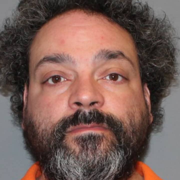 Harold Gogarty, 45, of Norwalk was charged with stealing BB guns from Walmart with his 16 year-old son.