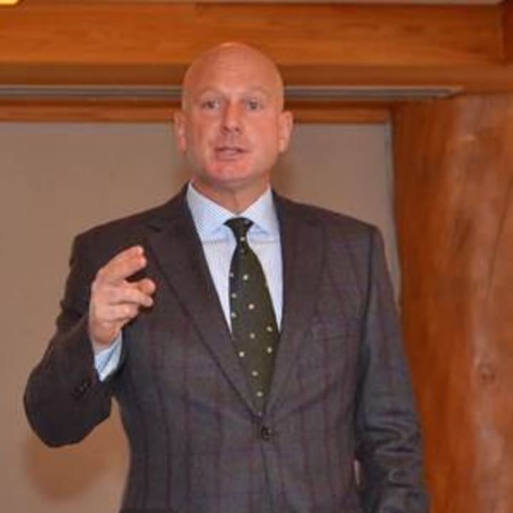 Dr. Jeffrey Altholz, addresses Engineers Union Local 137 and 825 at a seminar held at the Bear Mountain Inn.