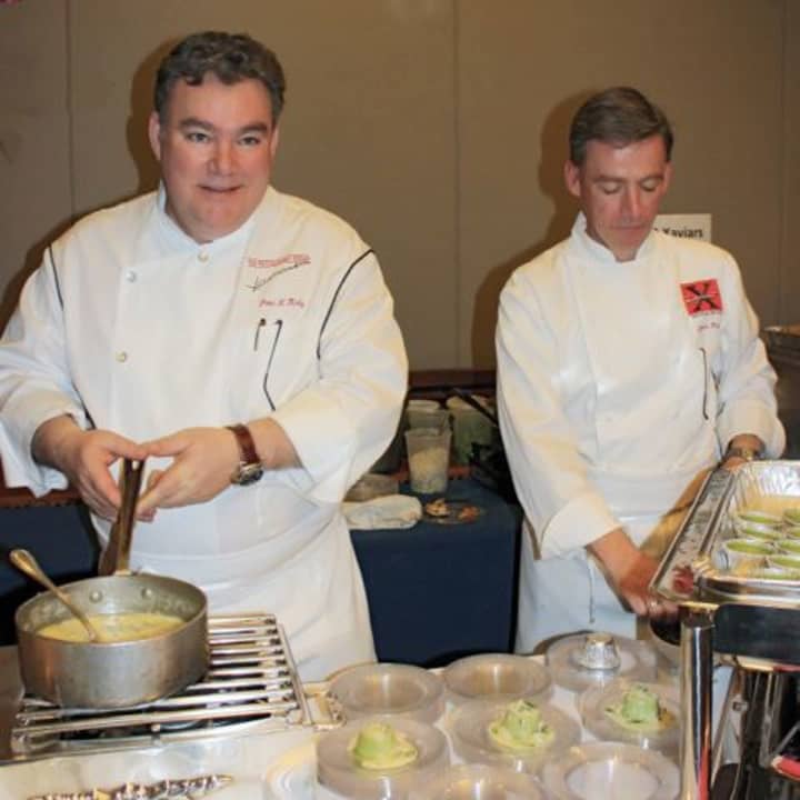 Chefs prepare food at the Westchester Culinary Experience in 2014.