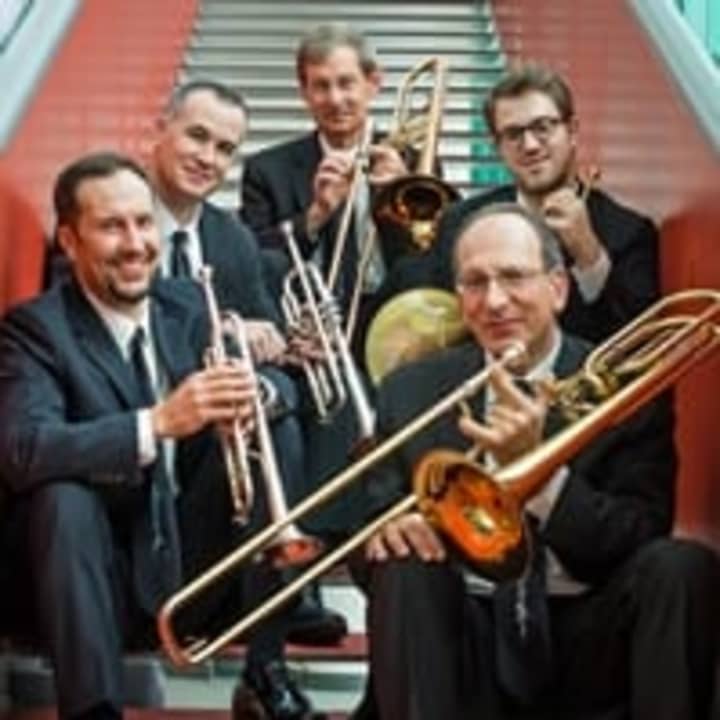 The American Brass Quintet are trumpet, Kevin Cobb
and Louis Hanzlik; horn, Eric Reed; trombone, Michael Powell;
bass trombone, John Rojak. 
