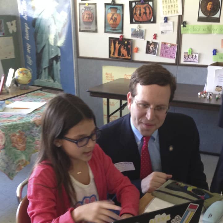 Assemblyman David Buchwald speaks to a Byram Hills student about technology in the classroom.