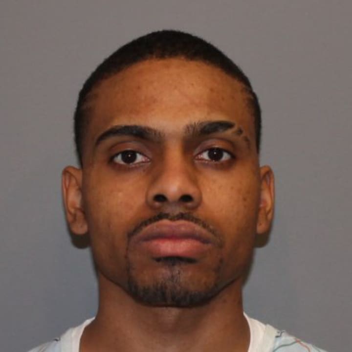 Derik McCoy, 26, was arrested on gun charges following shots fired in South Norwalk Sunday, according to police.