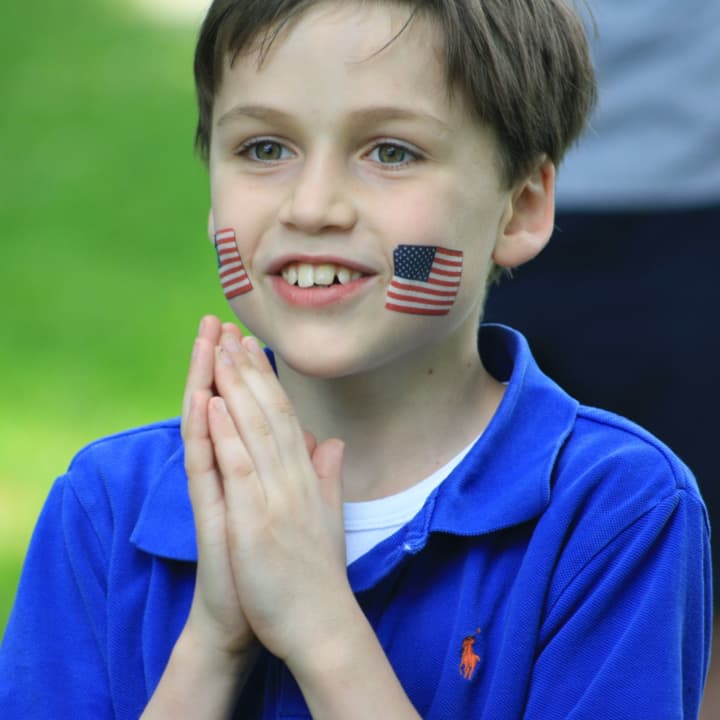 A boy shows his patriotism at a previous Memorial Day event in Fairfield.