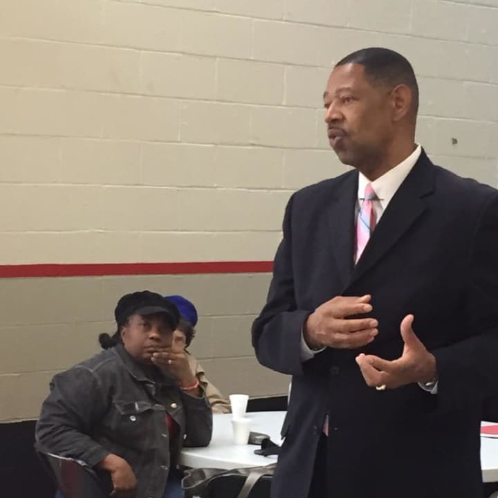 Superintendent Kenneth Hamilton explaining the schools budget to senior citizens at the Doles Community Center in Mount Vernon. 