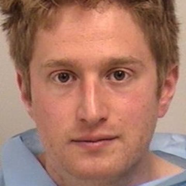 Daniel Fischer, 25, of New Haven, was arrested after being accused of causing a disturbance at Temple Israel in Westport, police said. 