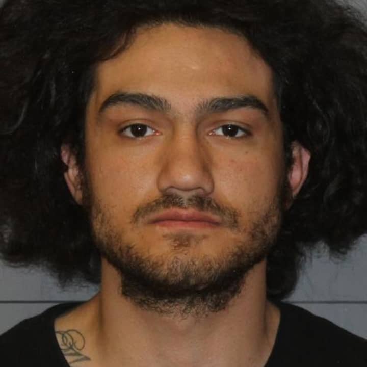 A Peekskill man was charged with assault after allegedly stabbing a man during an altercation at a Brewster restaurant. 