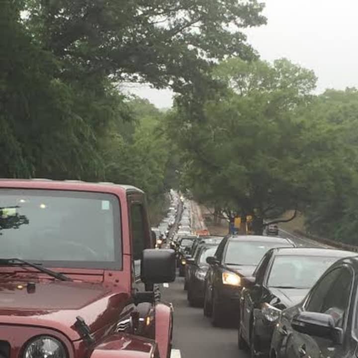 A fallen tree frustrates drivers on the Merritt Parkway on Monday.