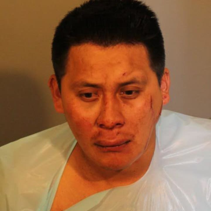 Adan Morales, 31, of Danbury, was arrested after he was spotted walking on Main Street, bleeding and carrying a knife. 