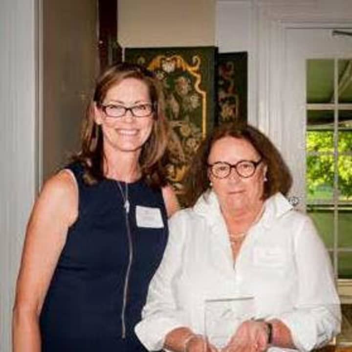 Patty Donovan-Duff, right, director of the Bereavement Center of Westchester, left, received the Community Fund Award for her work at the center. At left is Melinda Burge, director of The Community Fund.  
