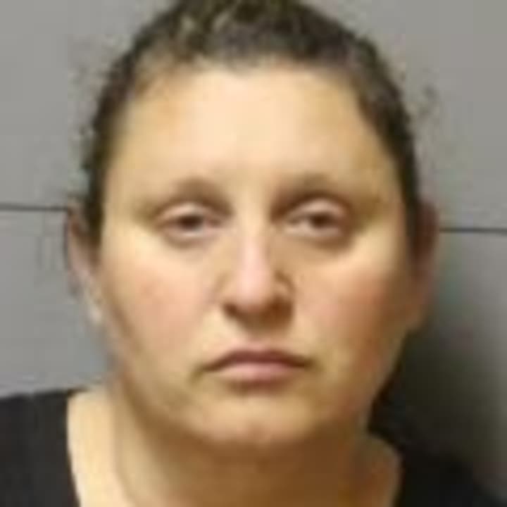 Vilma Nokaj, 41, of Mahopac, was charged with unlawfully providing discounts to family members, police said.