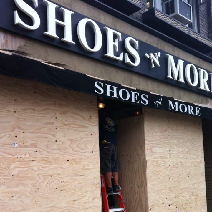 A Greenwich storefront was boarded up Sunday in preparation for Hurricane Sandy.