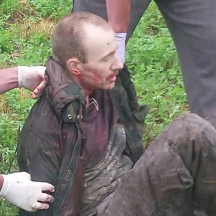 Convicted murder David Sweat as he is being taken into custody after being shot in Constable, N.Y., in a photo posted by CNN on Twitter.