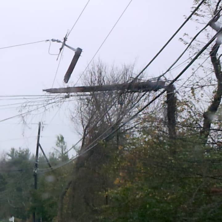 Pound Ridge is plagued by dozens of broken utility poles like this one on Route 124, making power restoration a difficult process.