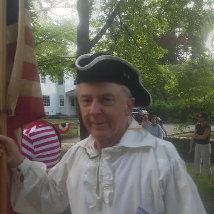 Bruce Beebe, Patriot and Wilton resident, is dressed in Revolutionary style for the Nod Hill Parade on Saturday. 