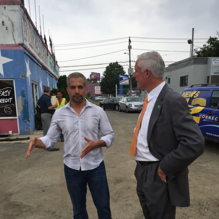 Bridgeport Mayor Bill Finch (D) talks with business owner Rahman Hashimi  at the groundbreaking of Hashimi&#x27;s restaurant Monday afternoon.