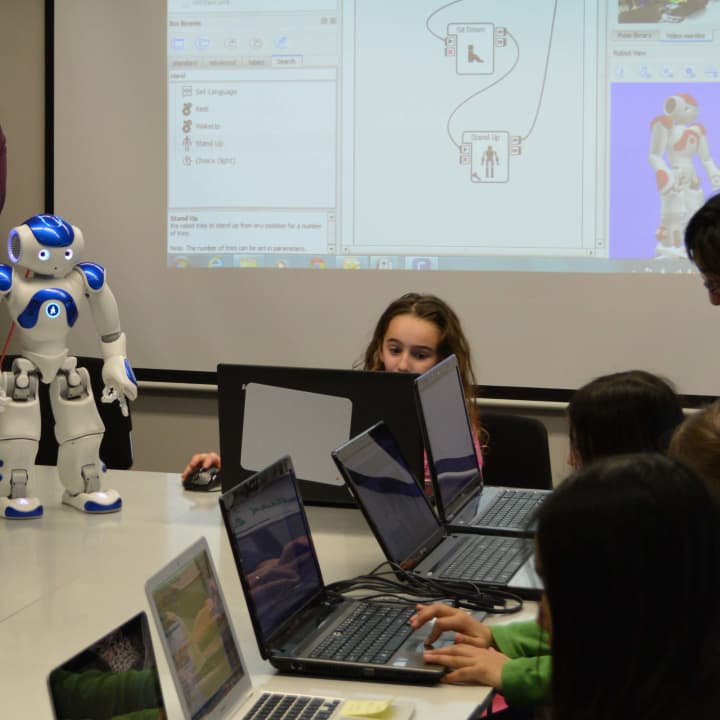 A student at Westport Library programs a robot at a past workshop in March. 