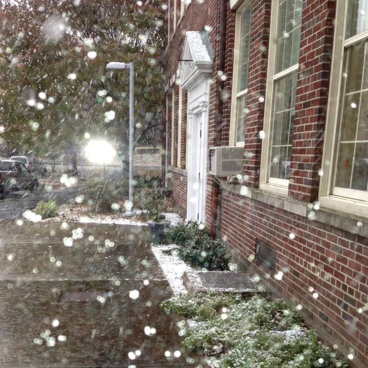 Snow accumulates outside Holmes Elementary School as the nor&#x27;easter hit Darien last week.