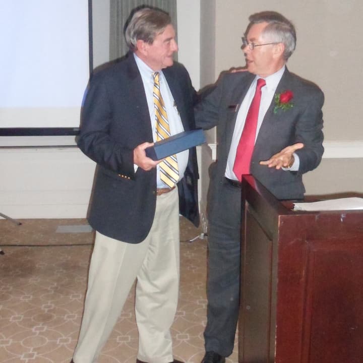 Walter Schalk, left, meets with outgoing chamber President Ralph Slater during Tuesday&#x27;s Wilton Chamber of Commerce&#x27;s Annual Dinner.