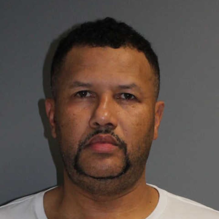 Tomas Morel of Bridgeport was charged with threatening a police officer&#x27;s mother. He was also charged in the theft of $83,800 worth of handbags from Norwalk manufacturer Dooney &amp; Bourke.