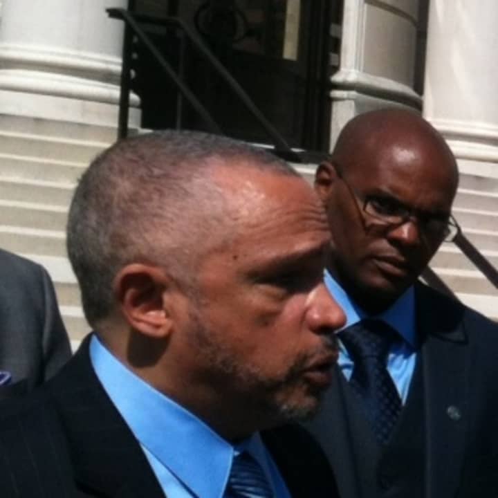 Randolph McLaughlin, foreground, a lawyer for the family of Kenneth Chamberlain Sr., added some details Monday to the family&#x27;s $21 million wrongful death lawsuit. Chamberlain was shot to death Nov. 19, 2011, by White Plains police at his apartment.
