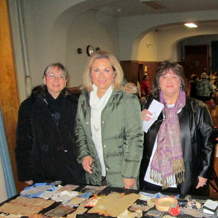 Lorry Skrobola, Andrea Bernardi and Barbara Branca, left to right, all returned to the Yonkers school to view the items from the time capsule buried in 1987.
