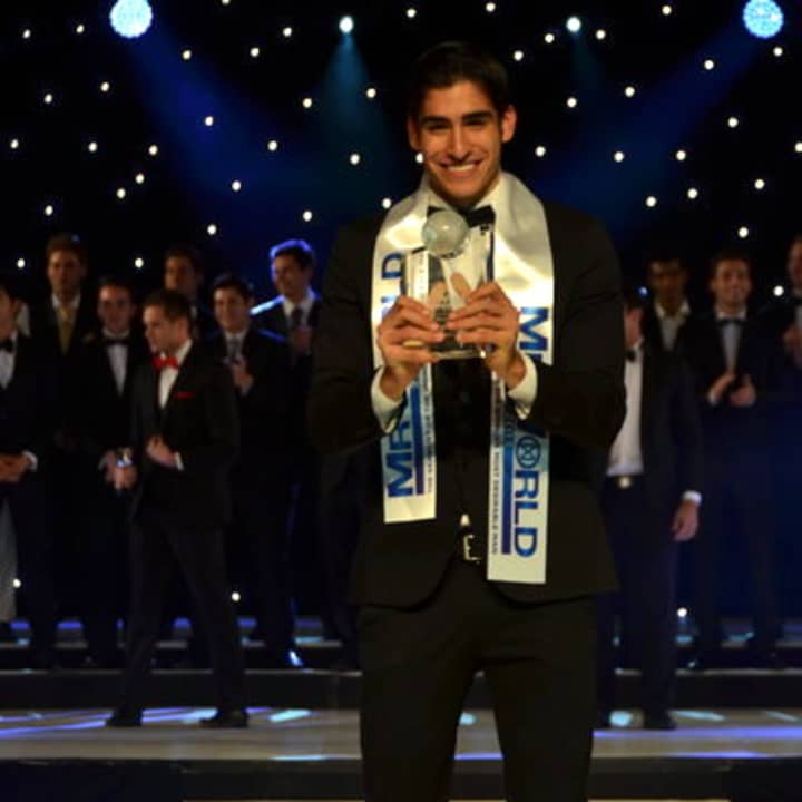 Monroe College pole vaulter Francisco Escobar won the two-week &quot;Mr. World&quot; competition in the United Kingdom.