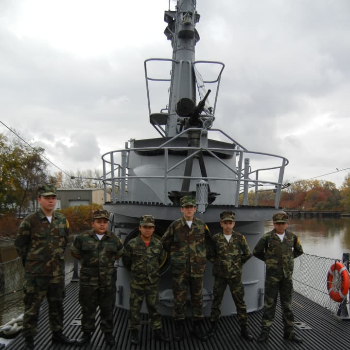 Kamerun LaBrier (far left) and other Young Marines from the White Plains chapter tour the USS Ling in New Jersey.
