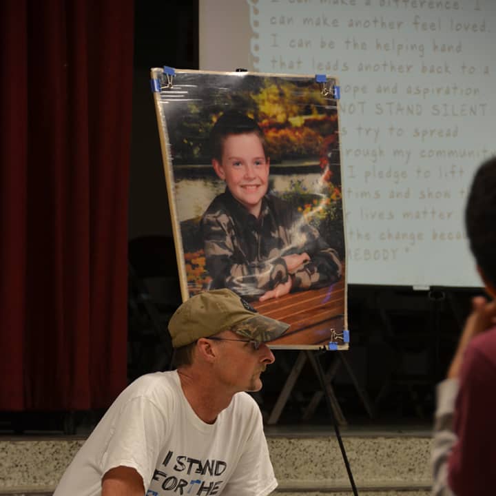 Kirk Smalley speaks Thursday at an AMD assembly featuring an anti-bullying program known as Stand For The Silent. 