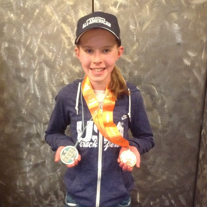 Angela Saidman of the Wilton Running Club finished seventh in her age group and earned All-American honors at the Junior Olympic cross country national championships.