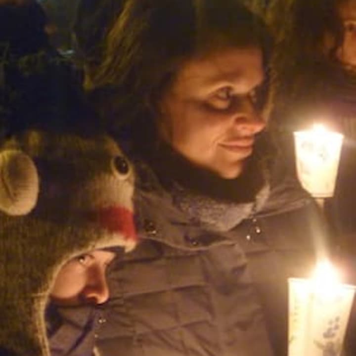 Candlelight vigils like this one in Dobbs Ferry on Sunday are continuing around the Greenburgh area to remember the victims of the Newtown school shooting.