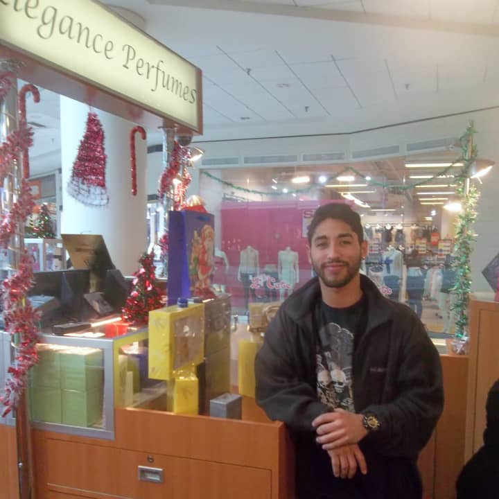 Mark Robles, an employee of Elegance Perfume at the White Plains Galleria, said many people were doing last-minute Christmas shopping Monday.