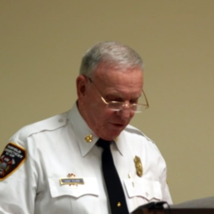 Fairfield Fire Chief Richard Felner reads a statement about his department&#x27;s promotion practices at Wednesday&#x27;s Board of Selectmen meeting.