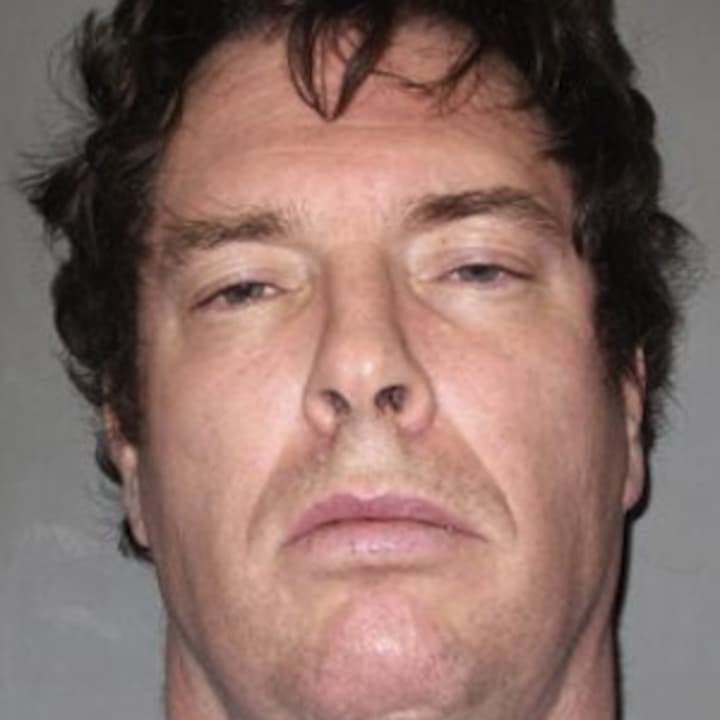 Police charged Christopher Howson, 49, after they say he strangled his wife on Saturday in Sleepy Hollow.