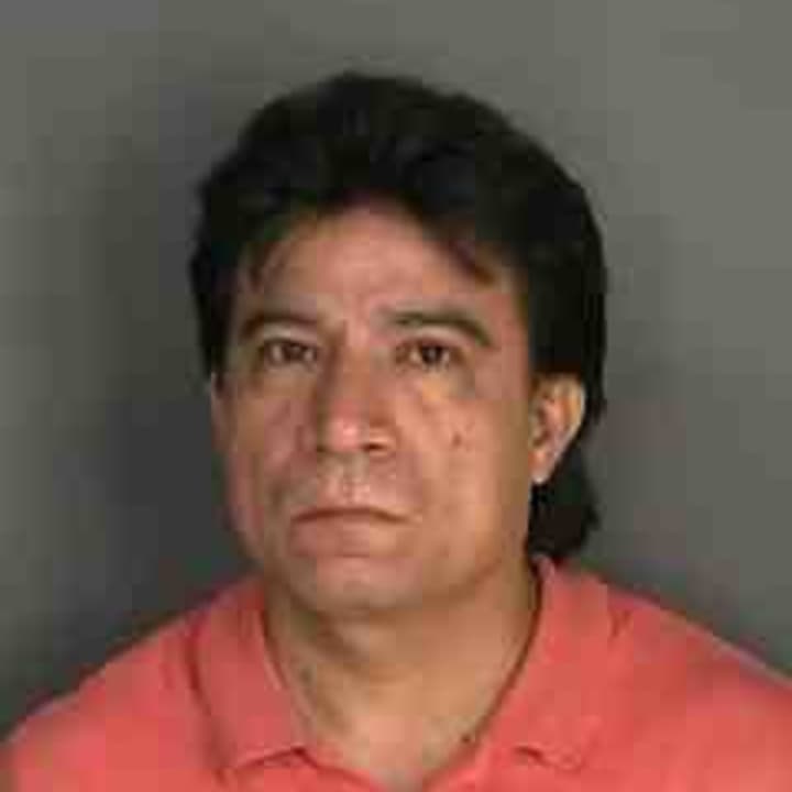 Melchiced Vilchis-Rosas of Yonkers was arraigned Thursday after prosecutors say he carried a loaded gun into a Yonkers bar and pointed it at a patron. The weapon went off during an ensuing scuffle. 