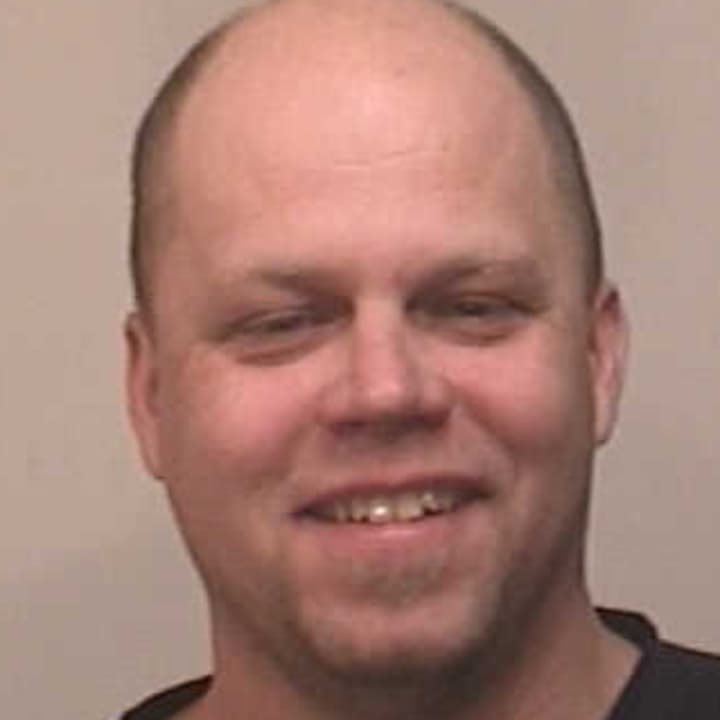 Lars Soderstrom, 44, of Westport was charged with threatening and larceny Saturday by Fairfield police. 