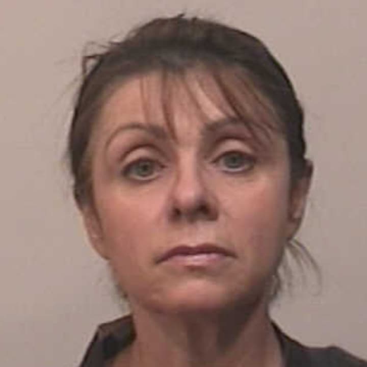 Larisa Lein, 52, of Trumbull was charged with third-degree larceny.