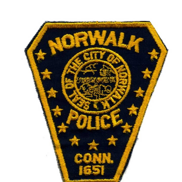 Norwalk police arrested a 30-year-old Seattle man Sunday for  allegedly not stopping after his car hit a detective&#x27;s vehicle.