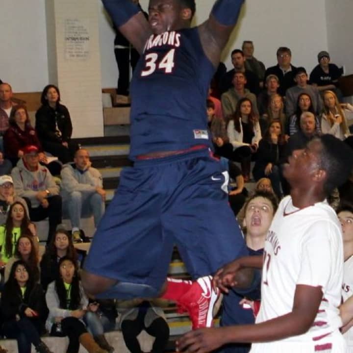 Sean Obi is averaging 18.7 points and 12.7 rebounds per game for the Greens Farms Academy boys basketball team.