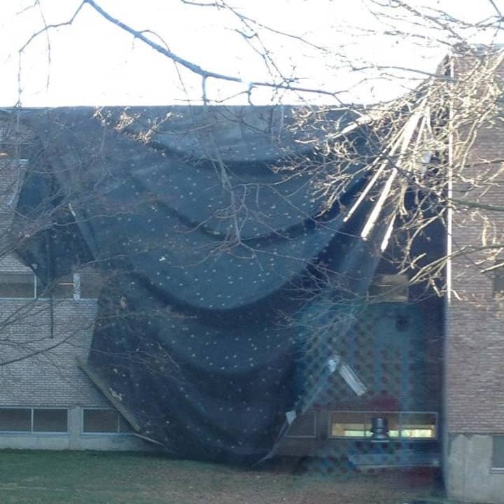 Fairfield Ludlowe High School&#x27;s roof saw &quot;significant damage&quot; Thursday morning from wind and rain. 